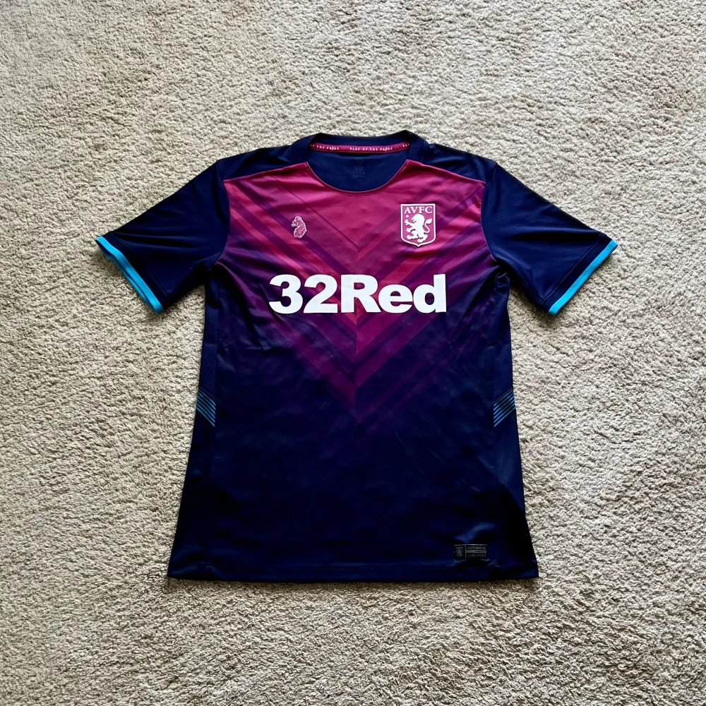 Front view of Aston Villa 2018/19 Luke 1977 3rd Shirt (32Red) - Men's Medium