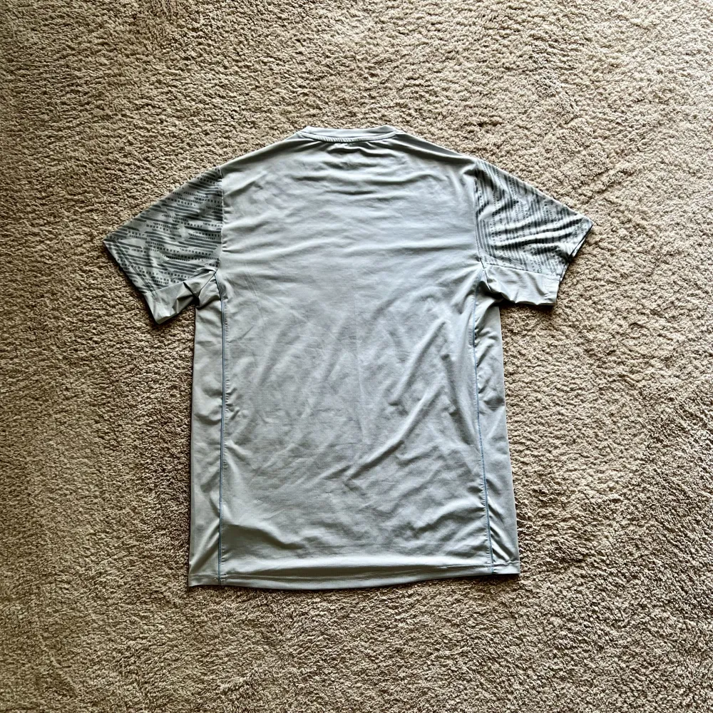 Rear view of Aston Villa 2022/23 Castore 4 Training Shirt (Cazoo) - Men's Medium