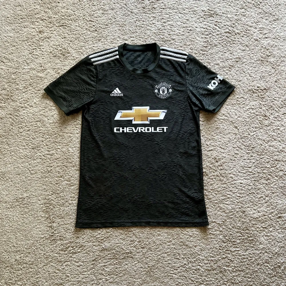 Front view of Manchester United 2020/21 Adidas Away Shirt (Chevrolet) - Men's Medium