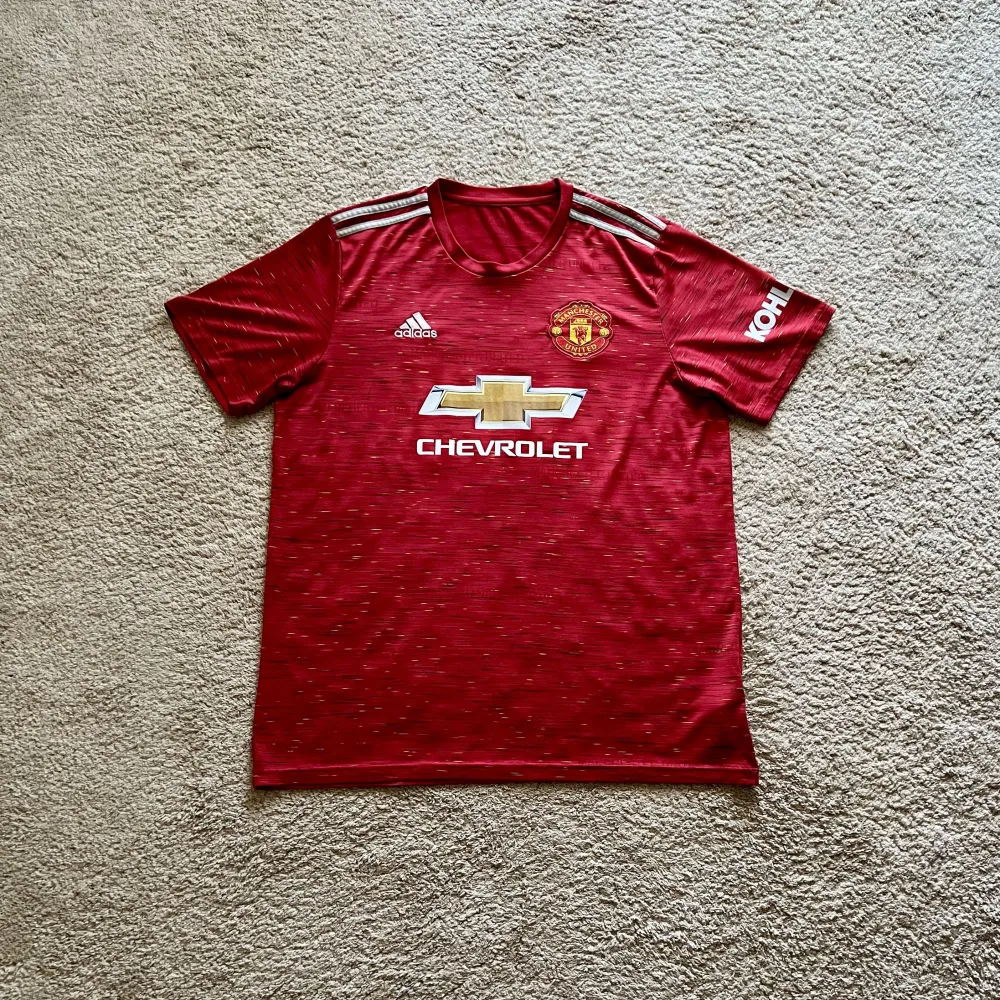 Front view of Manchester United 2020/21 Adidas Home Shirt (Chevrolet) - Men's XL