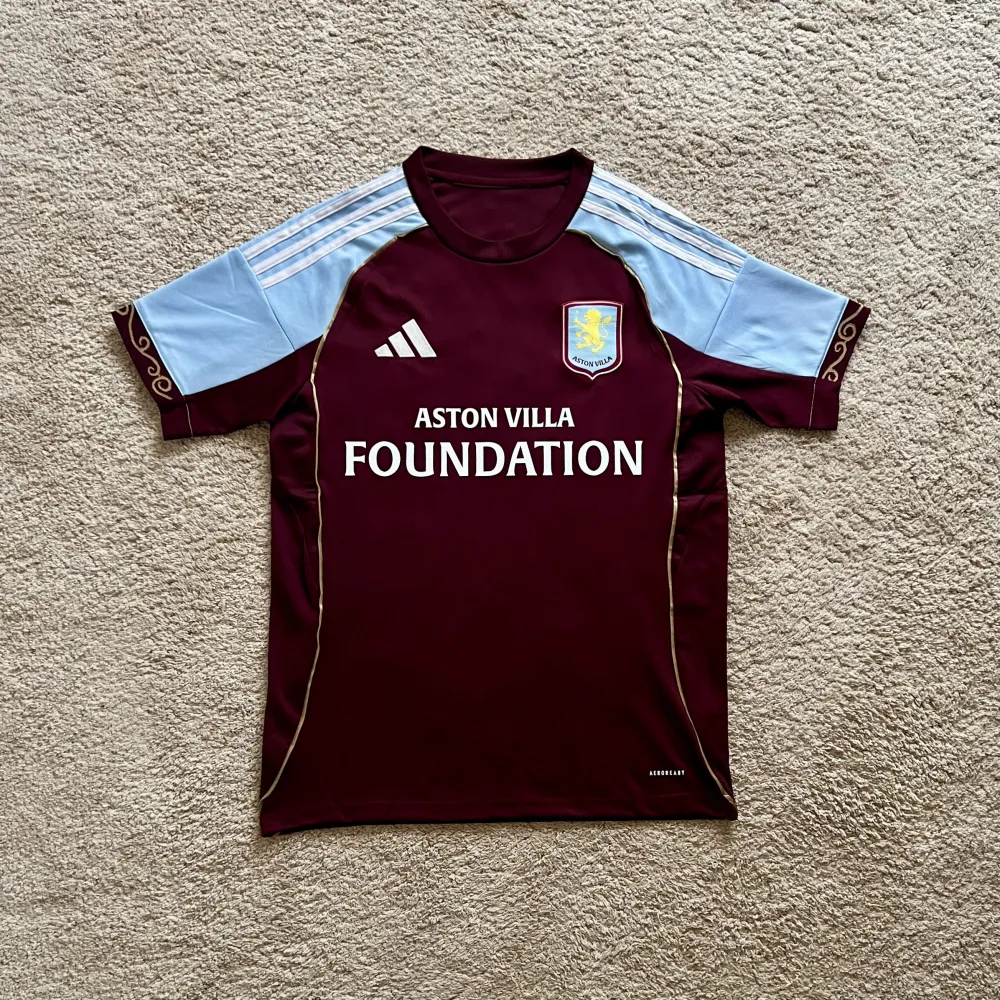 Front view of Aston Villa 2025/26 Home Shirt (Aston Villa Foundation) - Men's Medium