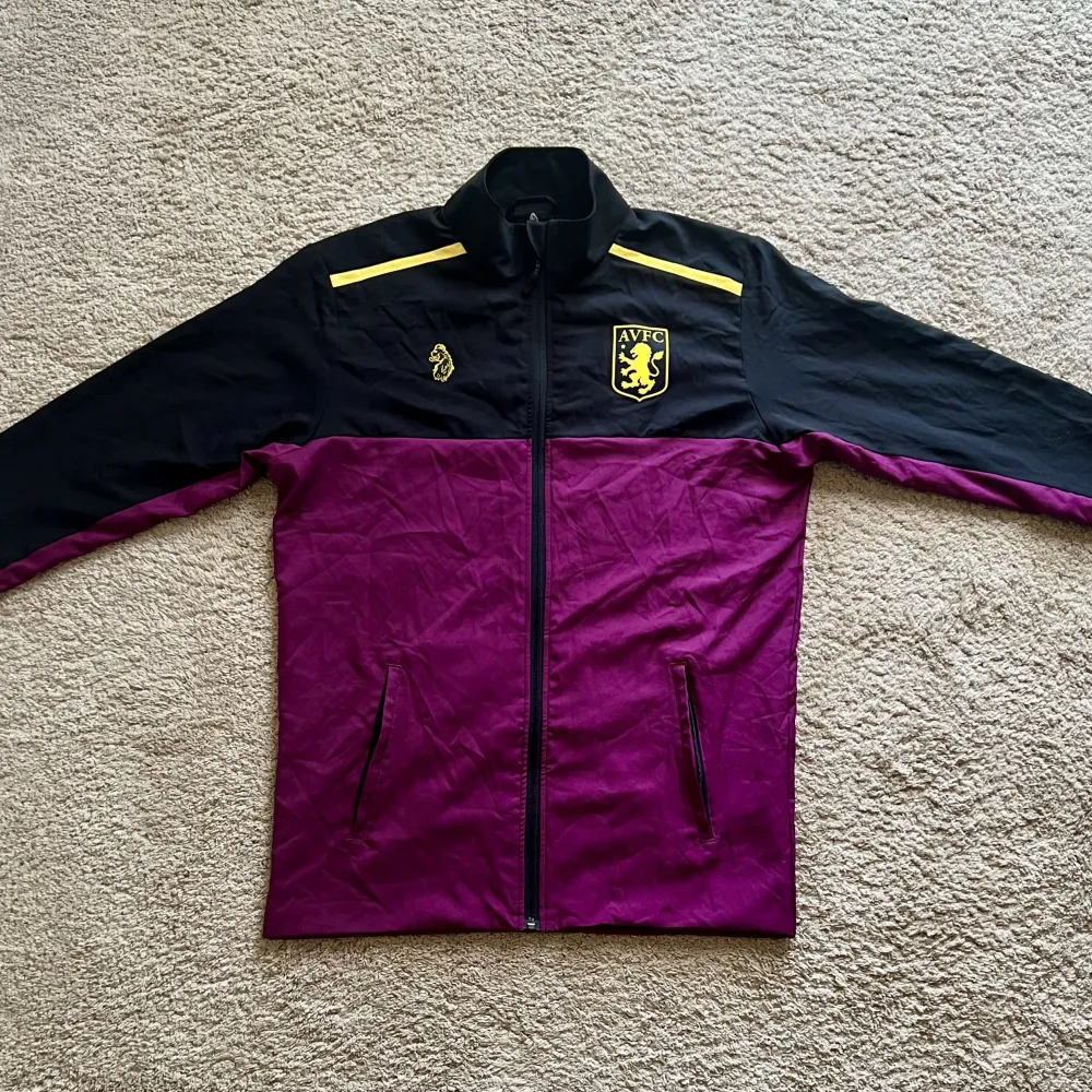 Front view of Aston Villa 2018/19 Luke 1977 Track Shirt - Men's Medium