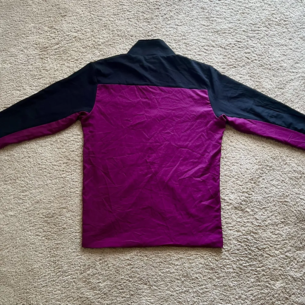 Rear view of Aston Villa 2018/19 Luke 1977 Track Shirt - Men's Medium